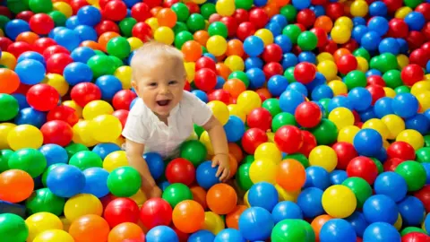 Getty Images Child in ball pool