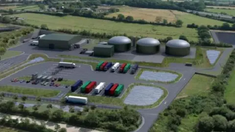 Computer generated image of anaerobic digestion plant, which features three large digester tanks, reception barn and small car park with several HGV lorries, all set within a green landscape. 