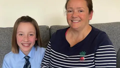 FAMILY PHOTO Imogen's mum Catherine, right, said her daughter's life was made difficult by unmade adaptations