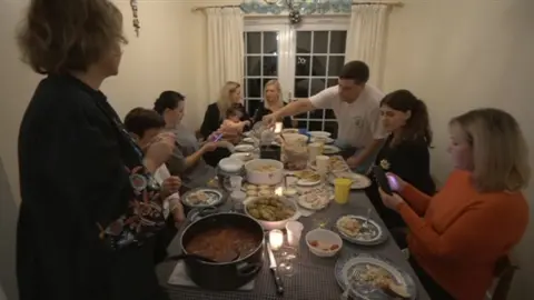 BBC Ukrainian families at table