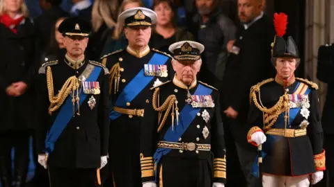 Reuters King Charles III, Britain's Princess Anne, Princess Royal, Britain's Prince Andrew, Duke of York, and Britain's Prince Edward, Earl of Wessex hold a vigil around the coffin of Queen Elizabeth II on 16 September 2022