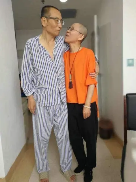 EPA An undated handout photo made available through the twitter account of Guangzhou-based activist Ye Du, shows Chinese dissident Liu Xiaobo (L) with his wife Liu Xia, at an undisclosed location.
