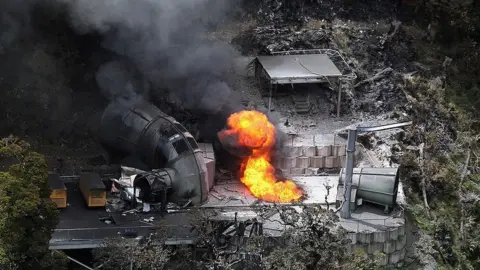 Getty Images Fire at the entrance to the mine