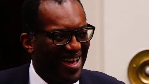 PA Media Kwasi Kwarteng outside Number 11 Downing Street on the day he was sacked