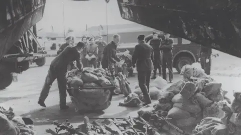 IBCC Food being loaded onto a Lancaster