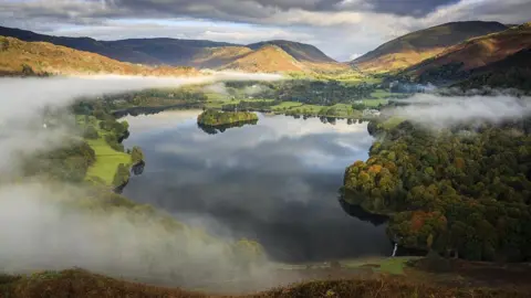 Getty Images Mist clearing over Grasmere viewed from Loughrigg Hill