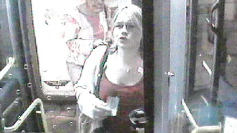 Metropolitan Police Amelie Delagrange boarding a bus in Twickenham on the night she was killed