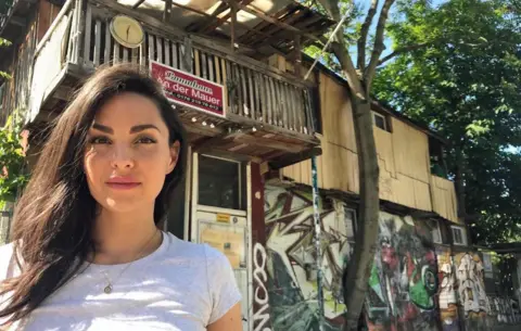 BBC Funda Kalin in front of the tree house her grandfather built