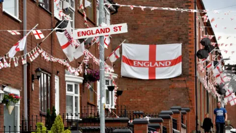 Getty Images A street covered in England flags