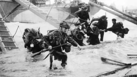 Getty Images British troops going ashore on D-Day