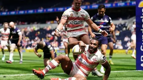 PA Media Edwin Ipape scores a try
