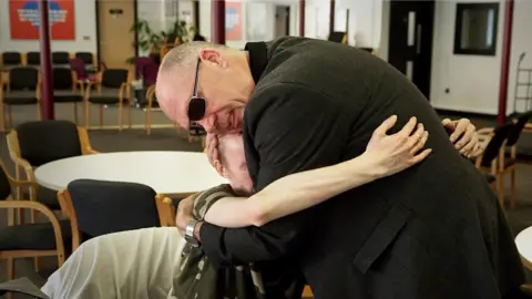 BBC Pastor Mick comforts John