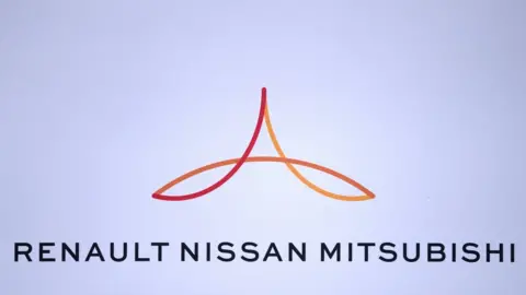 Getty Images Renault-Nissan-Mitsubishi logo is displayed during a 2017 press conference