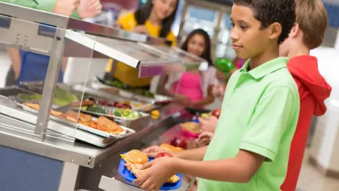 Getty Images children getting school meals