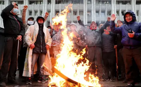 EPA People protest against the results of parliamentary elections at the presidential administration in Bishkek, Kyrgyzstan, 6 October 2020