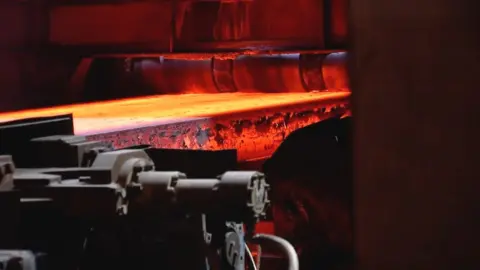 Molten steel rolling off a production line at Port Talbot steelworks