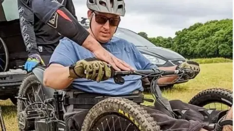 Matt Lathan Matt Lathan on his hand bike