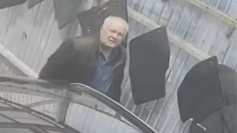 Met Police Paizan captured on CCTV entering the container