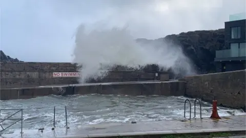 Waves breaking over tidal pool at Portstewart