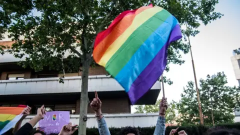 Getty Images People protesting against LGBTQ persecution in Chechnya