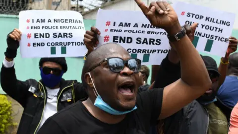 Getty Images Nigerians demonstrate in Kenya