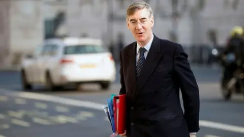 Reuters Jacob Rees-Mogg arrives at the Cabinet Office in Whitehall, London