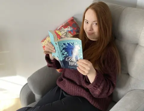 Down's Syndrome Association Maya reading The Good Hawk