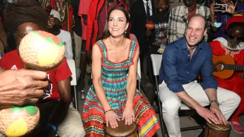 EPA The Duke and Duchess of Cambridge playing bongos in Jamaica