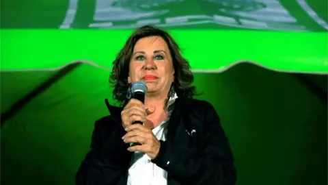 EPA The presidential candidate of Guatemala for the Union Nacional de la Esperanza Party, Sandra Torres, speaks during a campaign event at the La Reformita neighbourhood of Guatemala City, Guatemala, 08 June 2019.