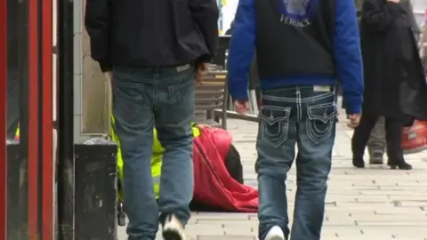 BBC Picture of homeless person on a street