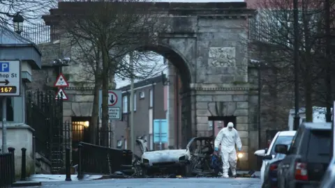 Press Eye Forensic officer at the scene of the explosion