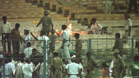 Getty Images 13 March 1996: Fires burn in the stands during the semi-final in the Cricket World Cup between India and Sri Lanka played at Eden Gardens in Calcutta. Mandatory Credit: Ross Kinnaird/ALLSPORT