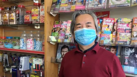 Xiaojian Liu runs Bedwas general store