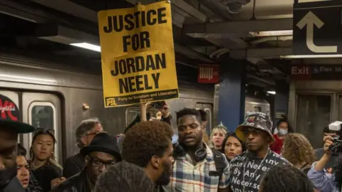 EPA Image from a vigil for Jordan Neely