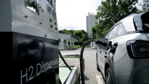 BBC car getting hydrogen from a petrol pump