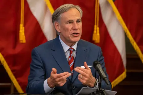 Getty Images Texas Governor Greg Abbott pictured on May 18, 2020 in Austin, Texas.