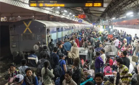 Getty Images Crowded platform at New Delhi Railway Station.. (Photo by Frank Bienewald/LightRocket via Getty Images