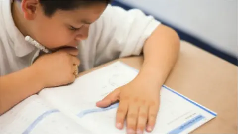 Thinkstock boy doing test