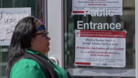 EPA Woman outside US job centre