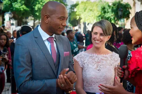 AFP Mmusi Maimane pictured with his wife, Natalie, in Cape Town ahead of the State of the Nation address on 16 February 2018.