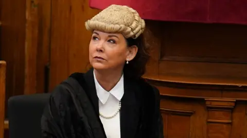 PA Media Dorothy Bain KC