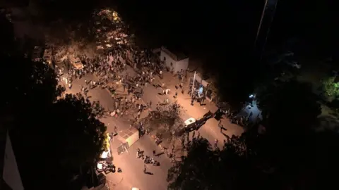 Getty Images Arial view of protesters in Sudan