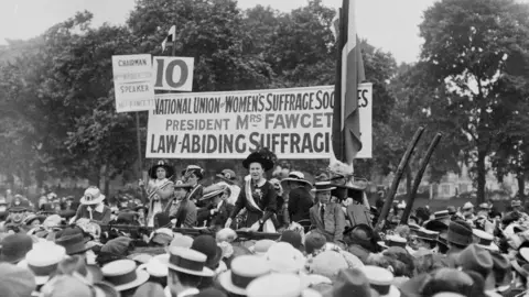 Getty Images Suffragette and educational reformer Dame Millicent Fawcett addressing a meeting in Hyde Park - circa 1913 - as president of the National Union of Women's Suffrage Societies