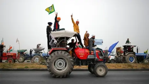 Reuters Farmers participate in a tractor rally to protest against the newly passed farm bills at Singhu border near New Delhi, India, January 7, 2021.