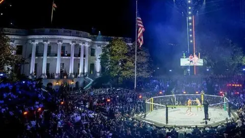 Justin Gaethje, mixed martial artist, and Ilia Topuria, mixed martial artist, during a lightweight championship bout during the UFC Freedom250 fight on the South Lawn of the White House in Washington, DC