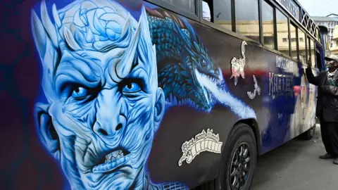 AFP A bus is seen in Kenya with graffiti of the Night King