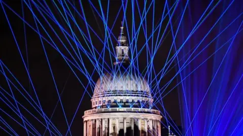 Reuters A light display to mark the New Year is seen over St Paul's Cathedral