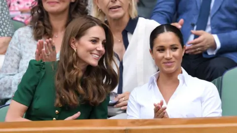 Getty Images Catherine, Duchess of Cambridge and Meghan, Duchess of Sussex attend the Women's Singles Final of the Wimbledon Tennis Championships at All England Lawn Tennis and Croquet Club