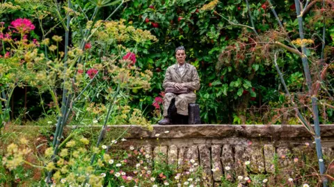 Woolley & Wallis Man Waiting by Sean Henry