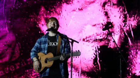 PA Ed Sheeran playing on stage